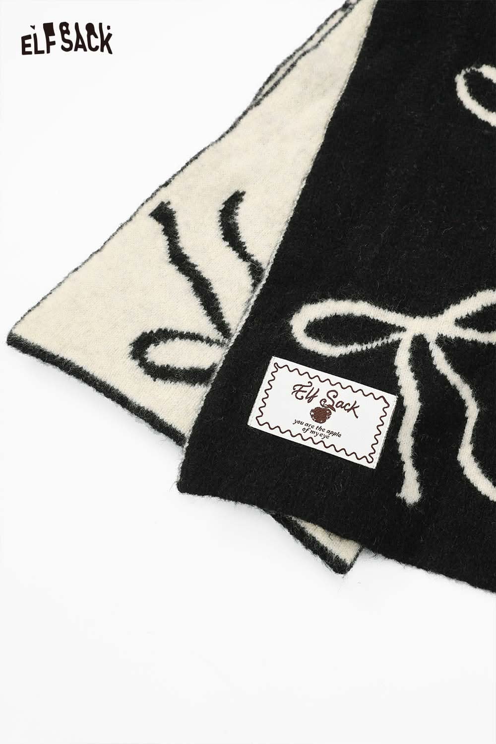ELFSACK bow graphic neck warmer in black and white with a stylish design for warmth and fashion