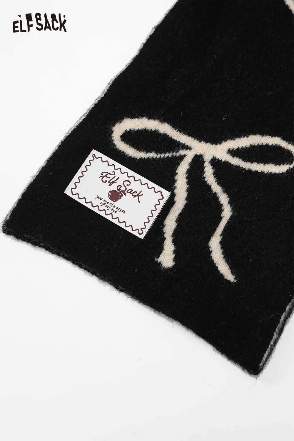 ELFSACK Bow Graphic Neck Warmer in black with cream bow design for stylish cold weather protection