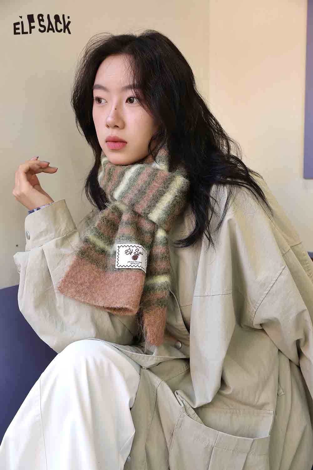 ELFSACK Christmas striped scarf for women in soft pastel colors, styled with a cozy outfit