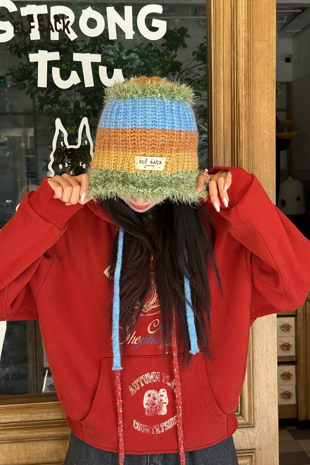 ELFSACK Color Block Knit Bucket Hat in vibrant hues, perfect for stylish outdoor wear