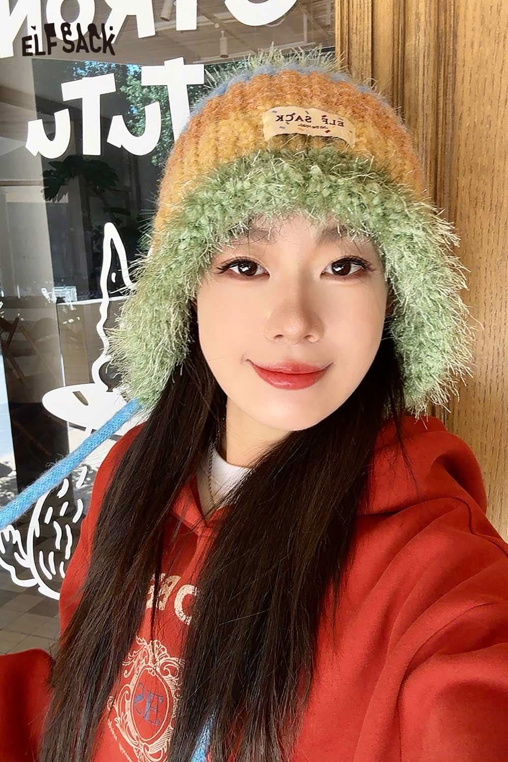 ELFSACK color block knit bucket hat featuring vibrant green, orange, and purple hues with a soft texture