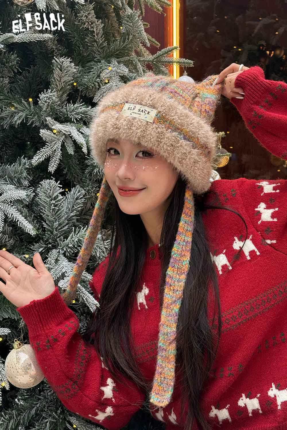 ELFSACK cute cat ear beanie for women featured in a cozy holiday setting with a festive red sweater