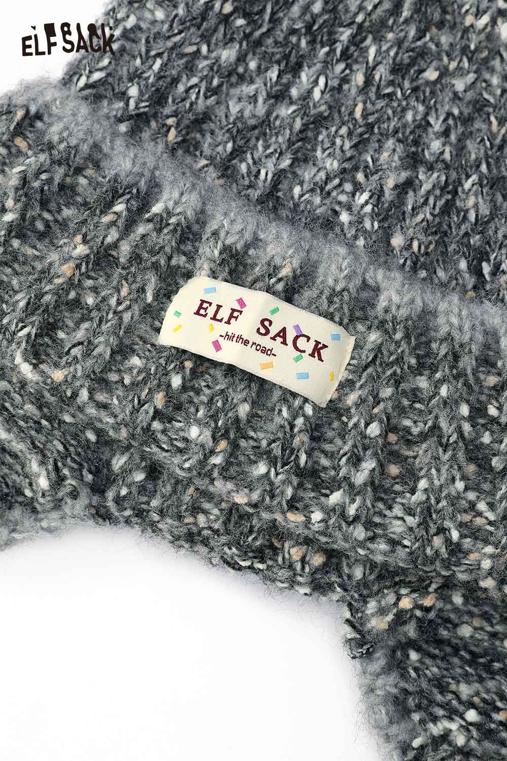 Gray knitted cute striped pom beanie for women featuring soft texture and playful pom design