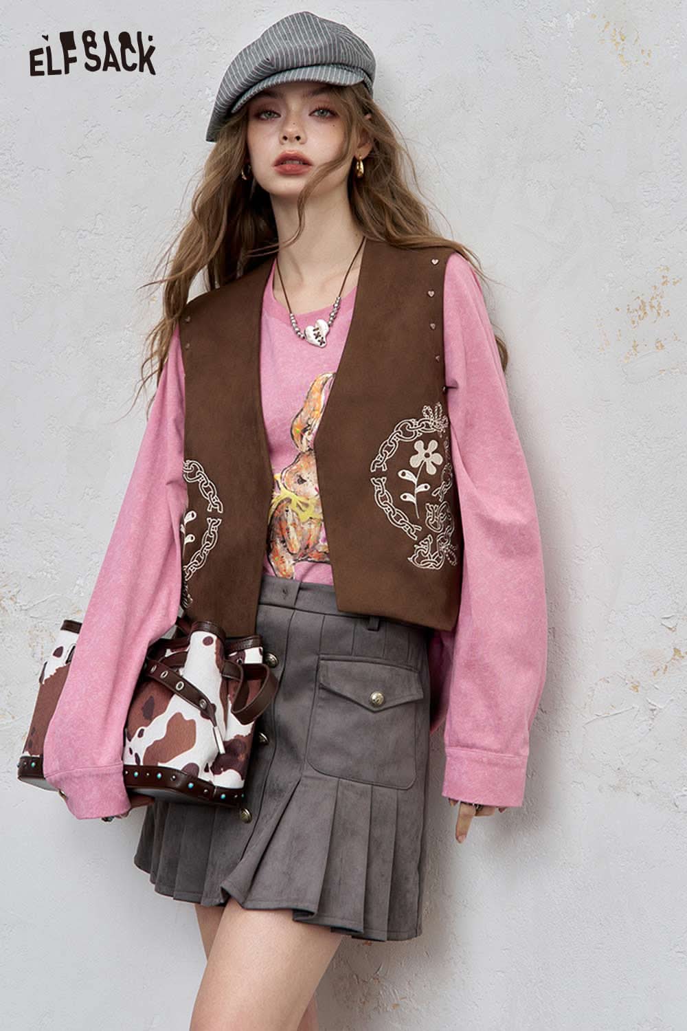 ELFSACK Women's Pink Organic Cotton Embroidered Long Sleeve Tee Styled with a Brown Vest and Skirt
