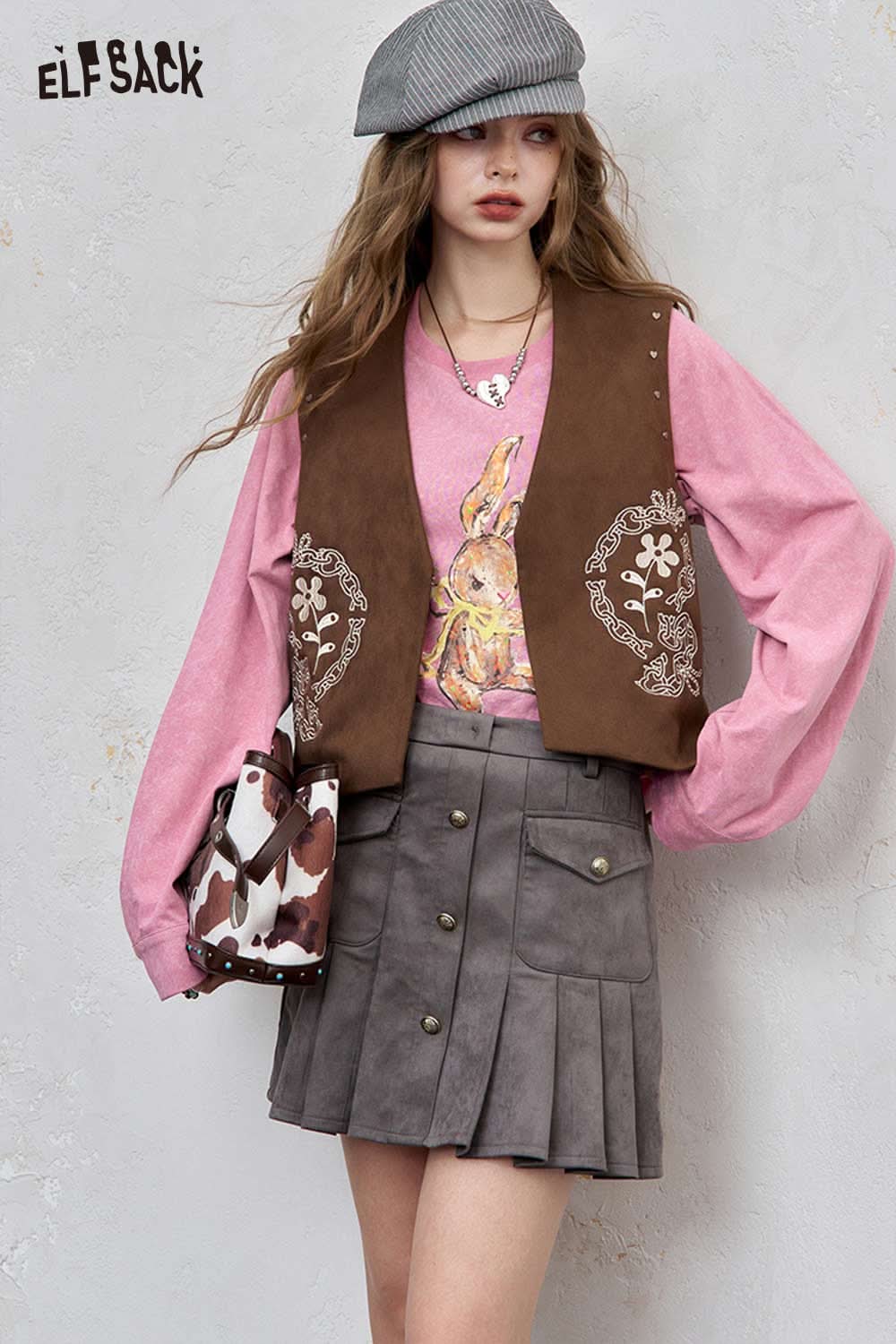 ELFSACK organic cotton embroidered long sleeve tee paired with a stylish vest and gray skirt