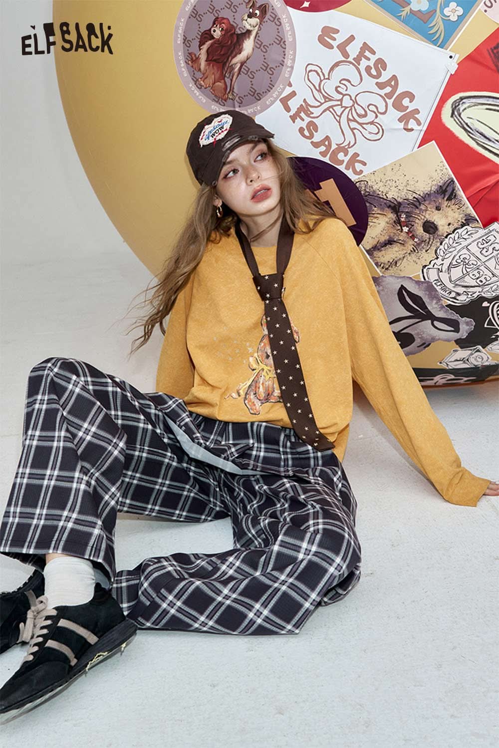 ELFSACK organic cotton embroidered long sleeve tee in mustard yellow with a stylish graphic design