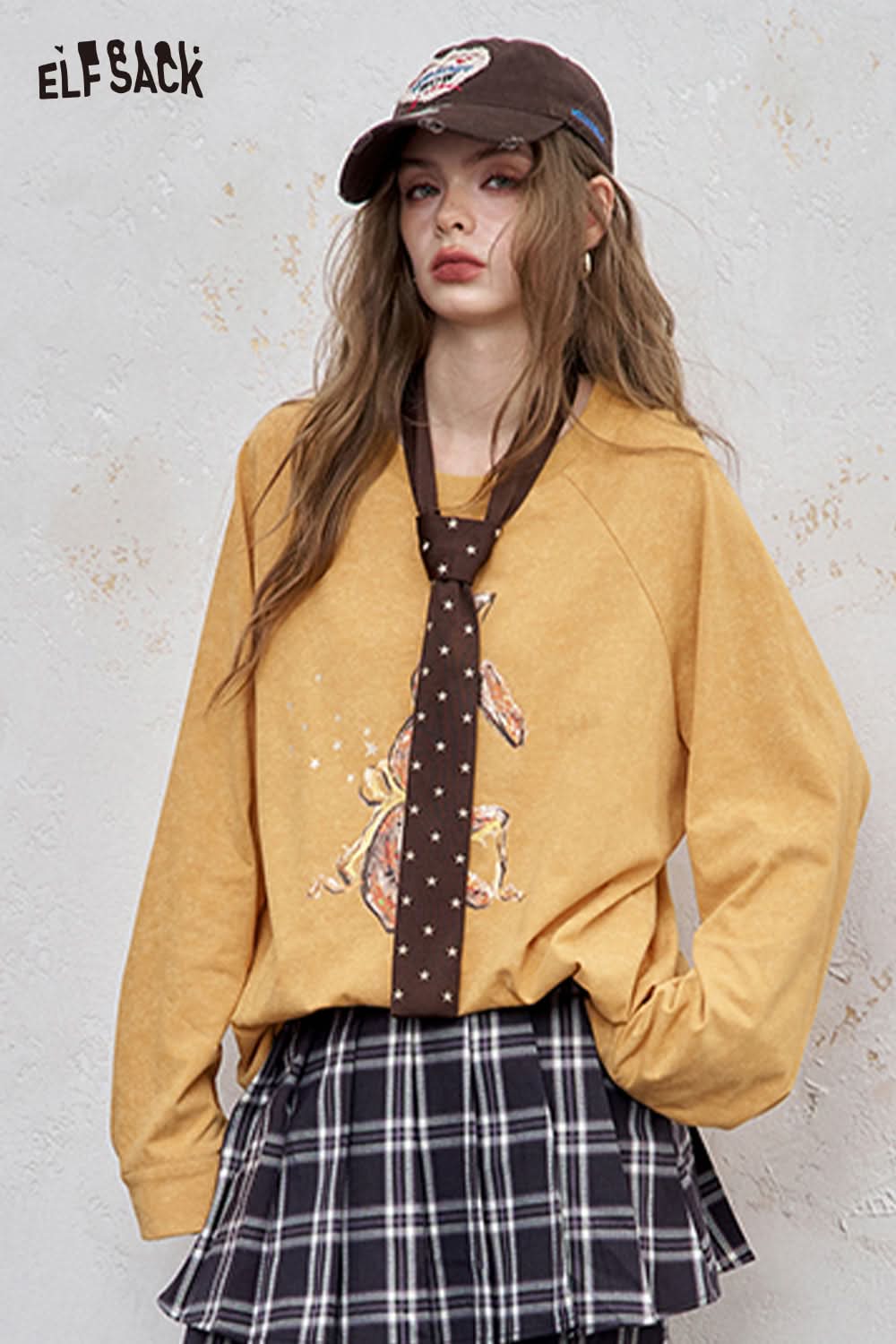 ELFSACK organic cotton embroidered long sleeve tee in mustard with a stylish design and loose fit