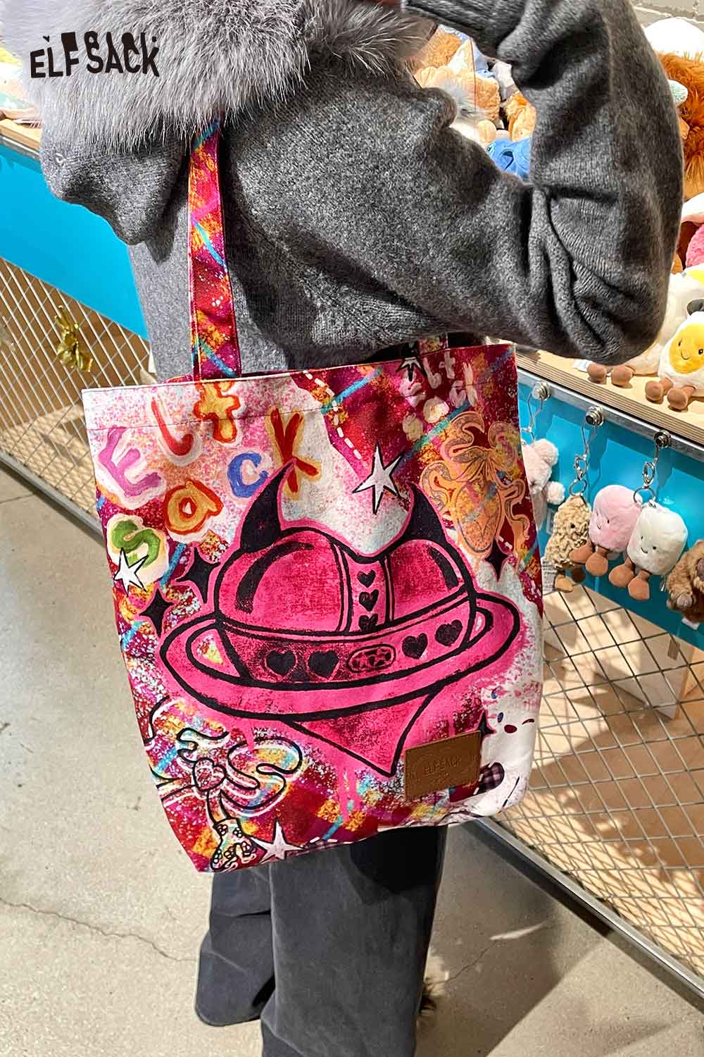 ELFSACK plaid graffiti tote bag with colorful design and sturdy straps for stylish everyday use