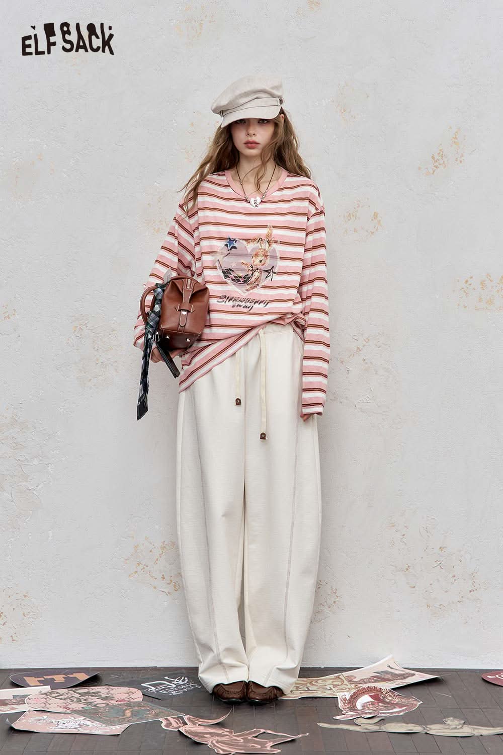 ELFSACK playful embroidered stripe shirt featuring a relaxed fit and unique graphic design