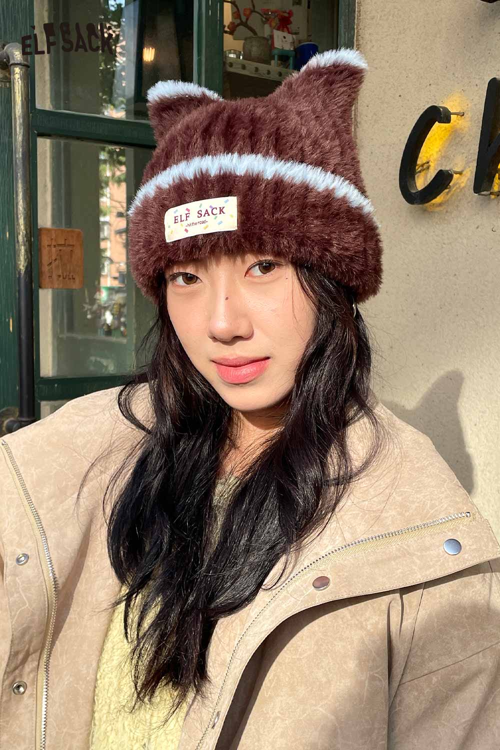 Cozy brown plush cat ear hat for women by ELFSACK, perfect for winter fashion accessories