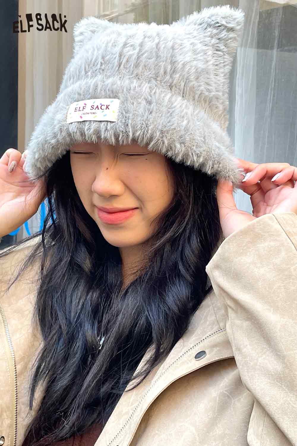 Soft gray plush cat ear hat for women by ELFSACK, perfect for cozy and stylish winter wear