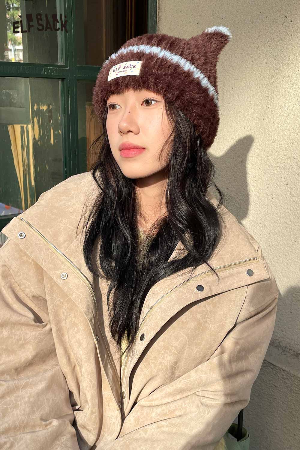 Cozy ELFSACK plush cat ear hat for women in brown with stylish design, perfect for winter outfits