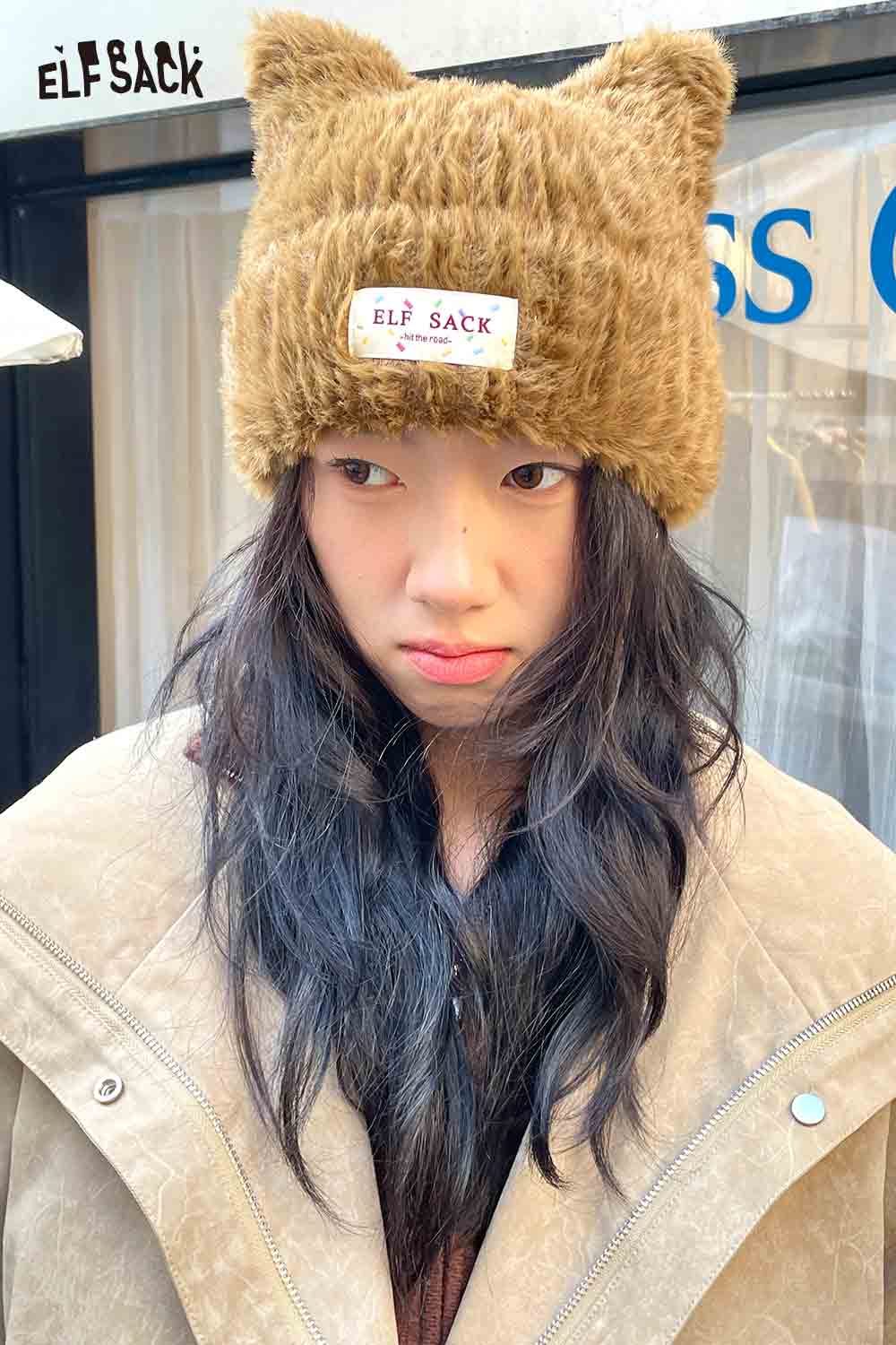 Trendy plush cat ear hat for women in brown, featuring ELF SACK logo for a stylish look