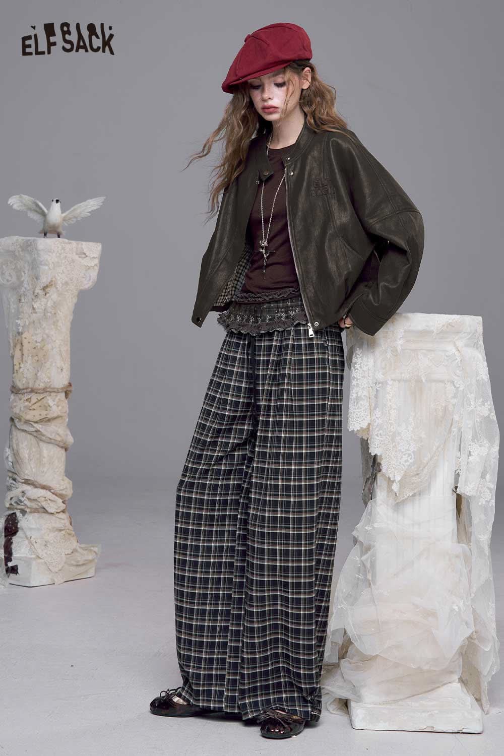 ELFSACK PU leather batwing sleeve jacket styled with plaid wide-leg pants and a burgundy cap