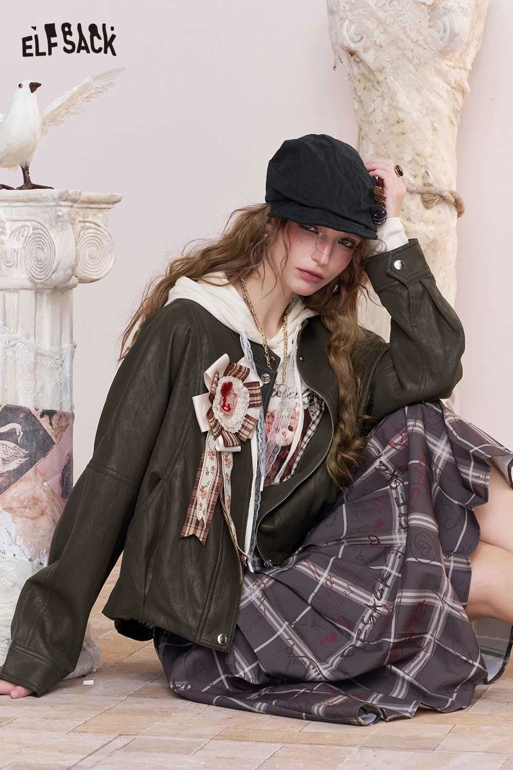 ELFSACK PU leather batwing sleeve jacket styled with a vintage floral brooch and layered outfit