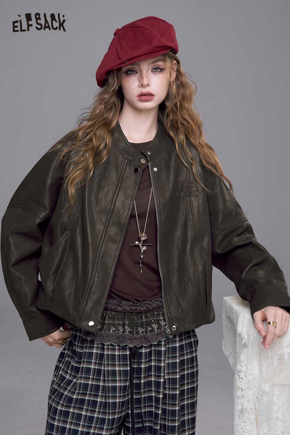 ELFSACK PU leather batwing sleeve jacket in dark brown worn with a stylish outfit