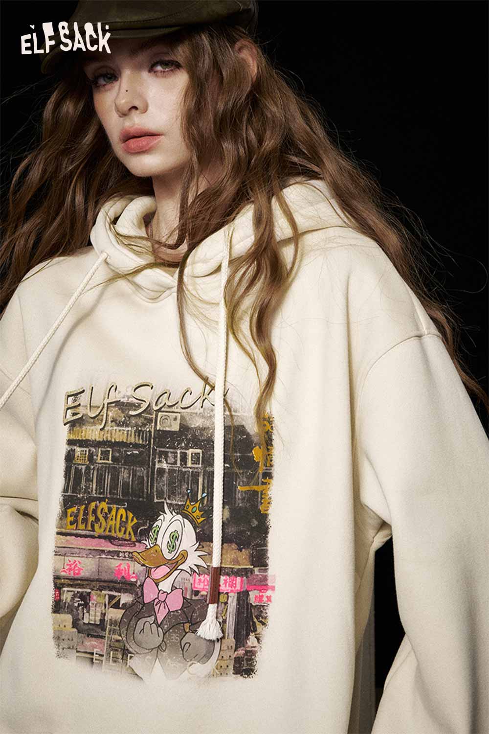 ELFSACK soft graphic hooded sweatshirt in cream with colorful cartoon print design