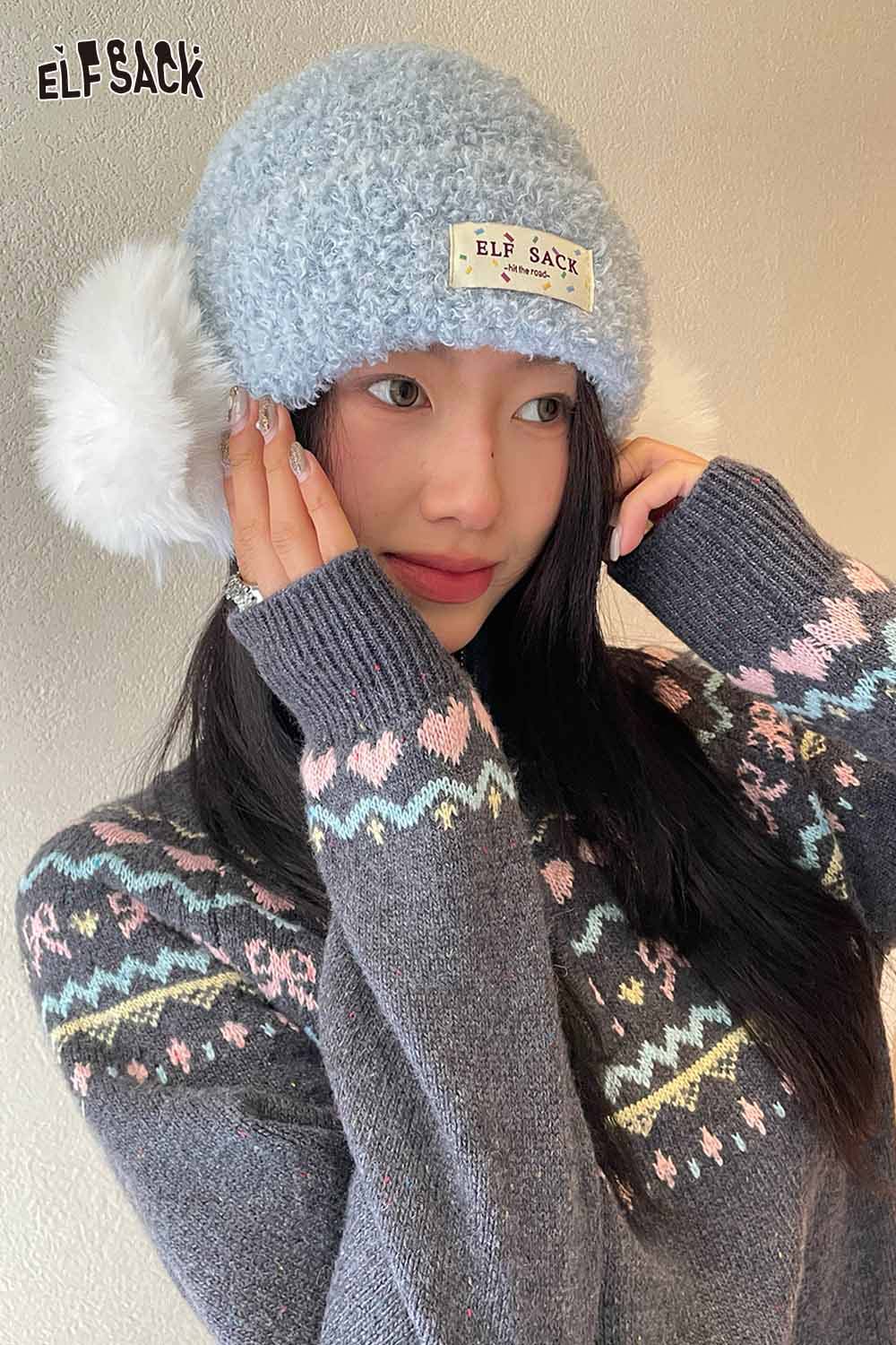 ELFSACK white plush ear muff beanie with soft ear covers for winter warmth and style