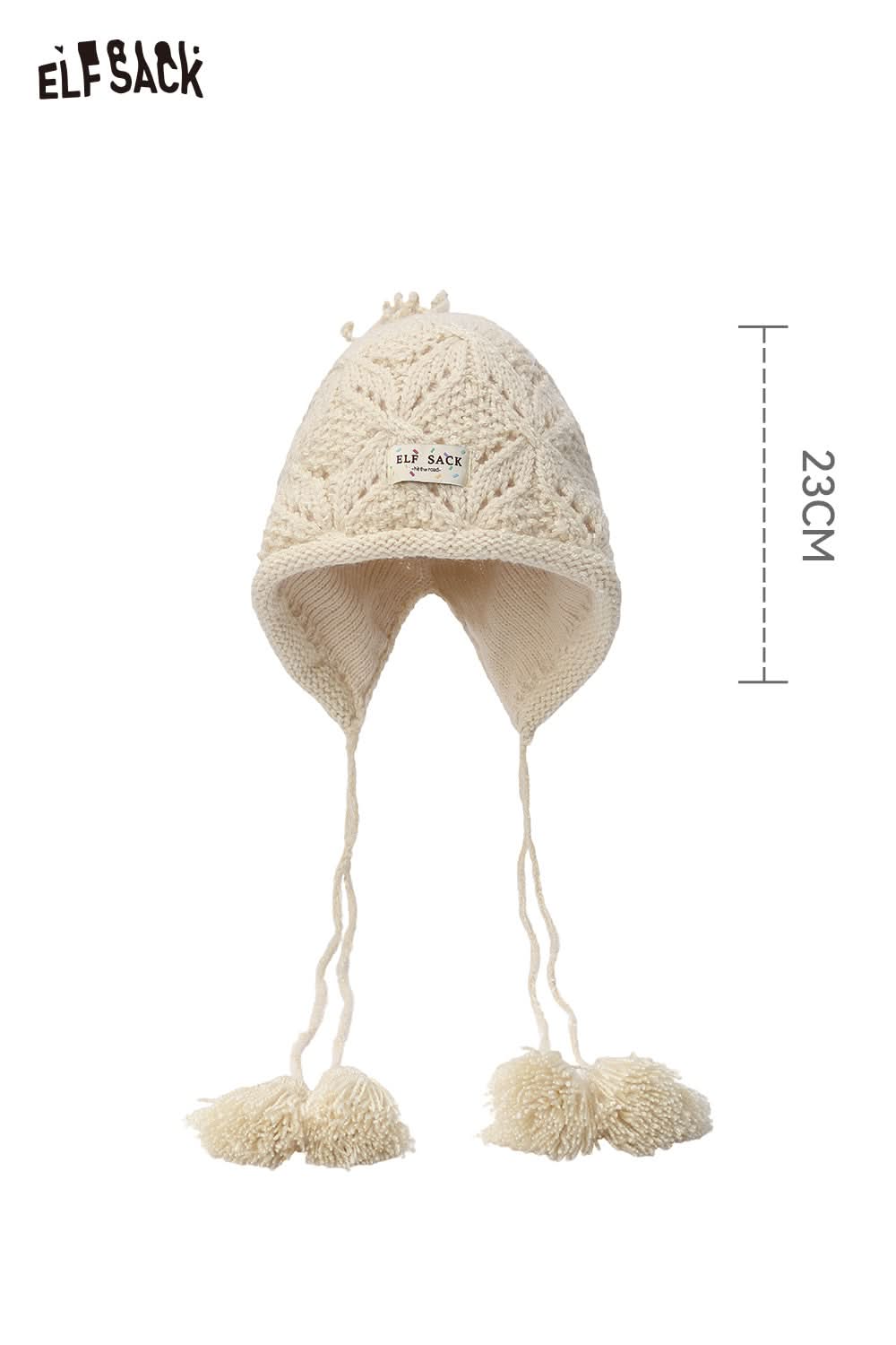ELFSACK women's braided tassel bucket hat in cream color with cozy pom poms and warm design