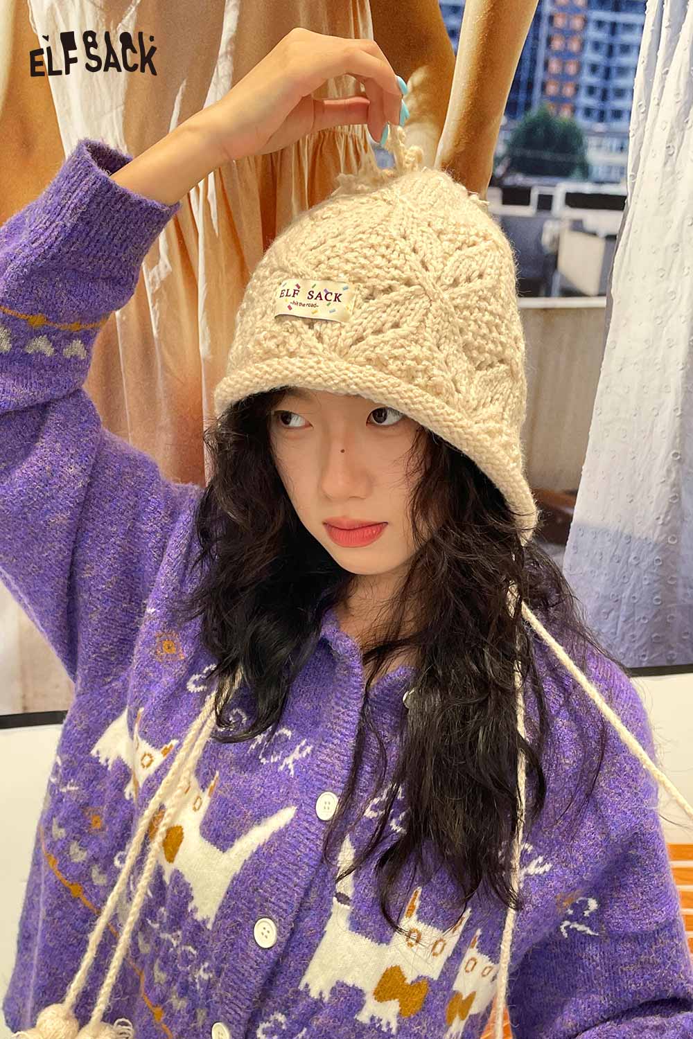 ELFSACK women's braided tassel bucket hat in beige, perfect for casual outdoor style.