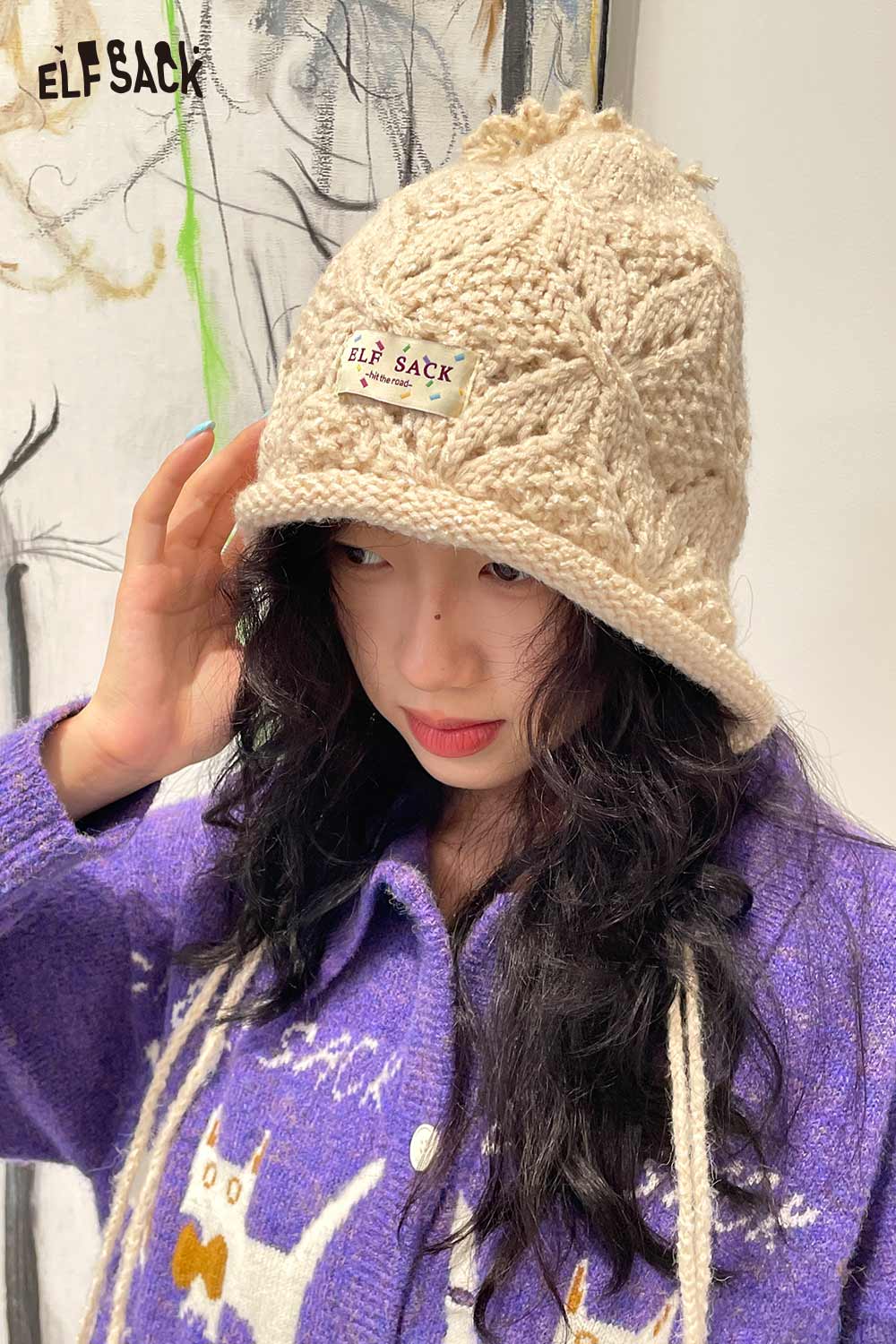 ELFSACK women's braided tassel bucket hat in beige with a charming design for stylish outfits