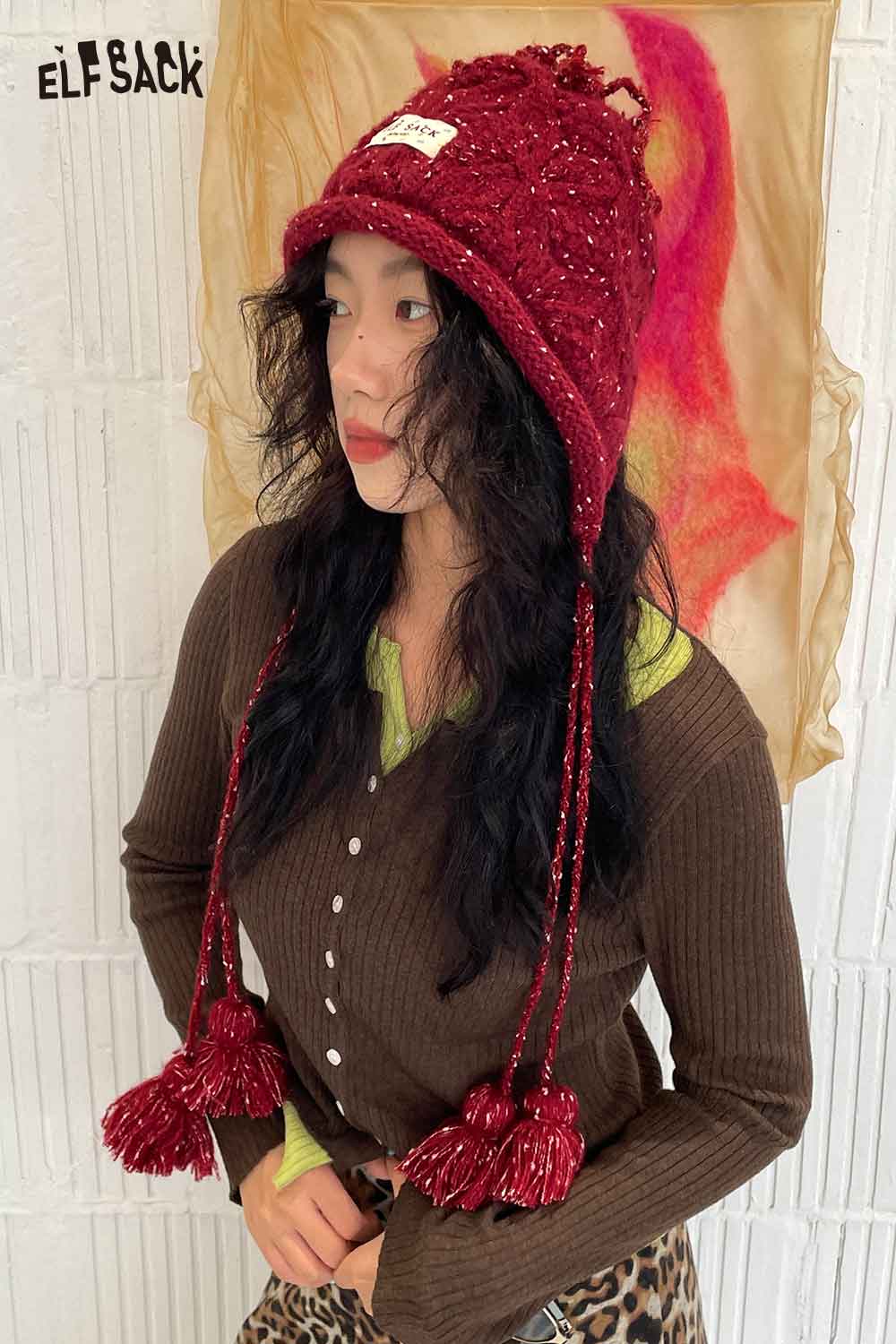 ELFSACK women's braided tassel bucket hat in red with playful tassels for a trendy look
