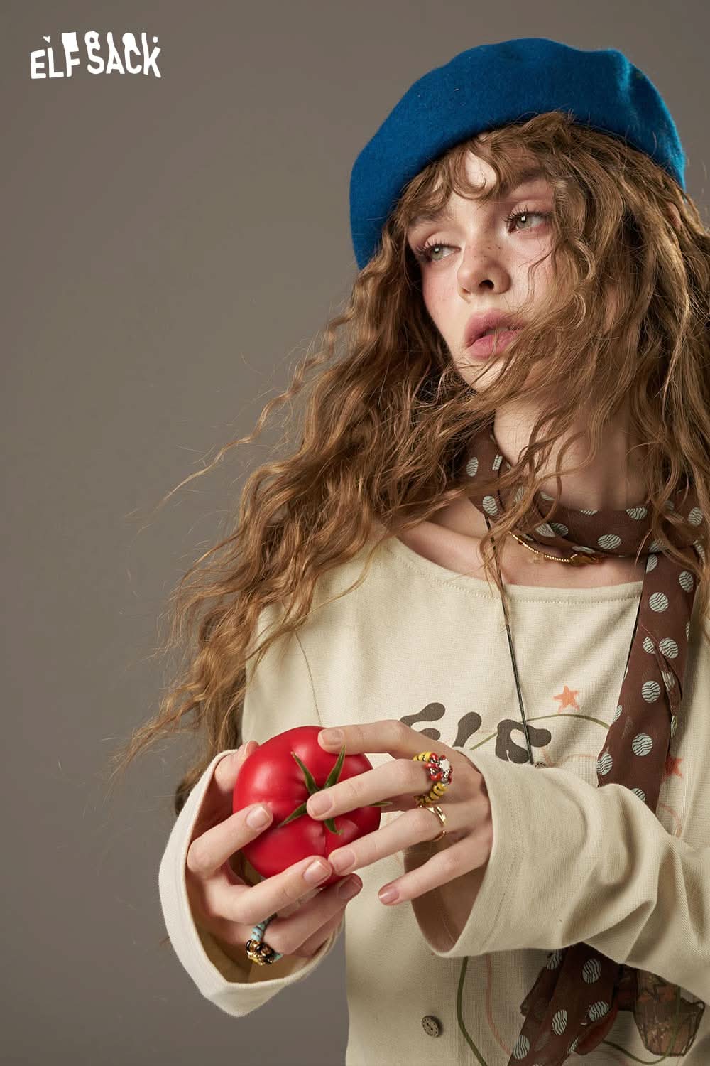 ELFSACK women's cotton printed long sleeve shirt styled with accessories and a playful apple prop