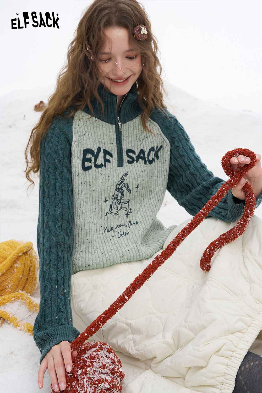 ELFSACK women's graphic color block knitwear with zip detail and cable knit design, perfect for cozy winter days