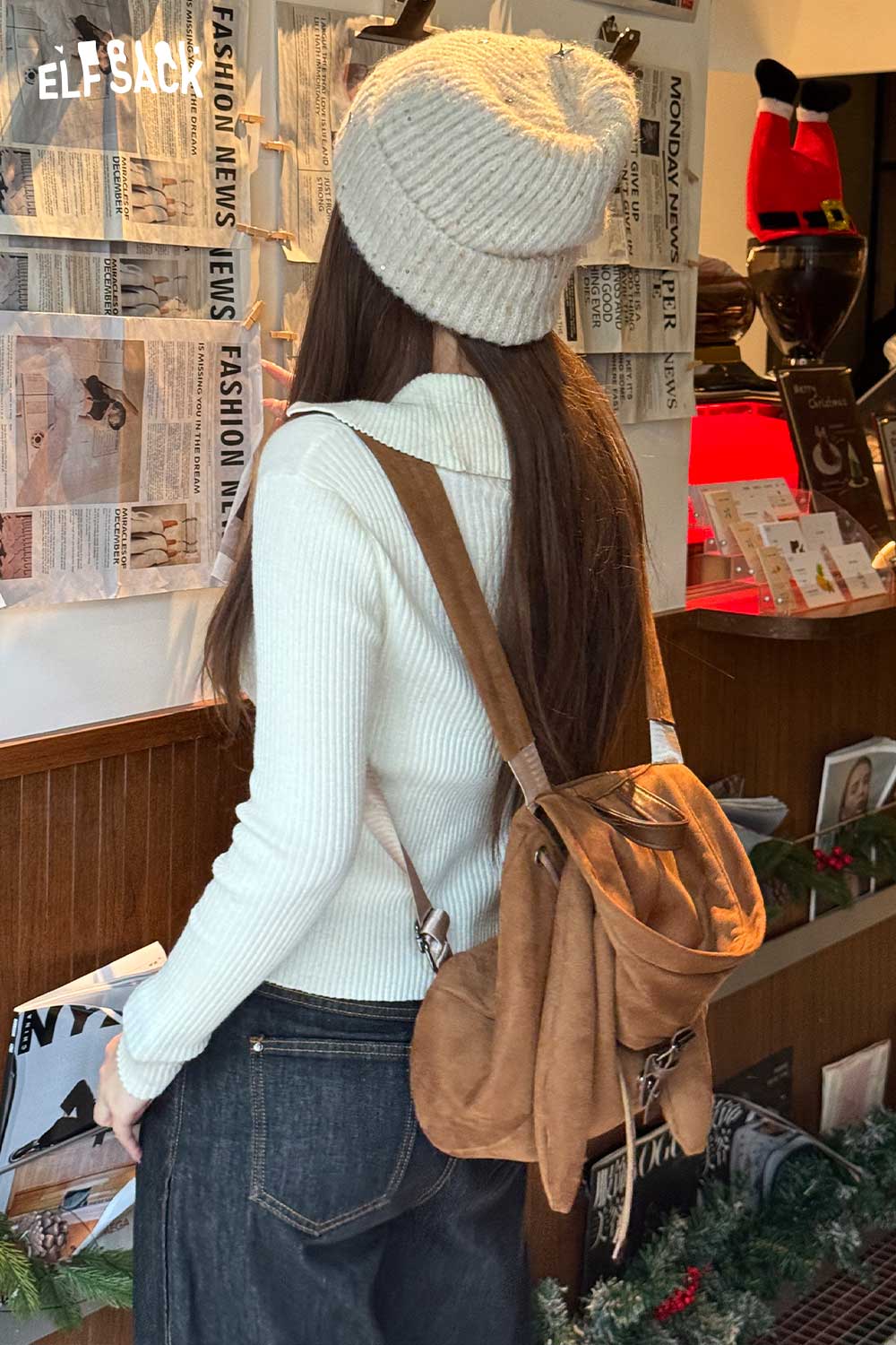 ELFSACK bunny ear backpack for women in tan suede with adjustable straps and a stylish design