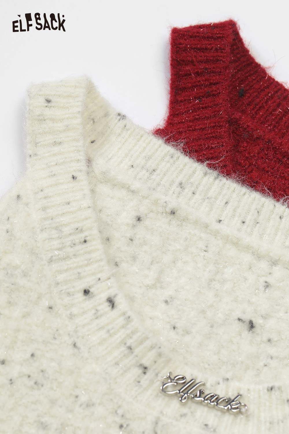 ELFSACK bow embellished cutout sweater featuring a soft, textured design in cream and red colors