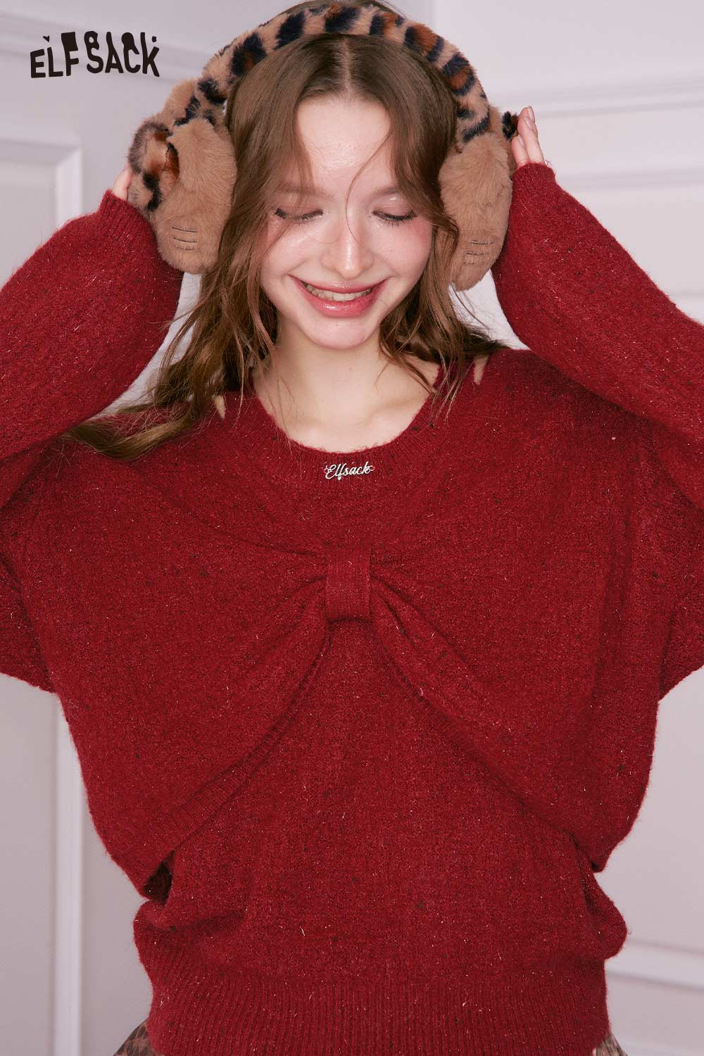 ELFSACK bow embellished cutout sweater in red with a stylish design and cozy fit for winter fashion
