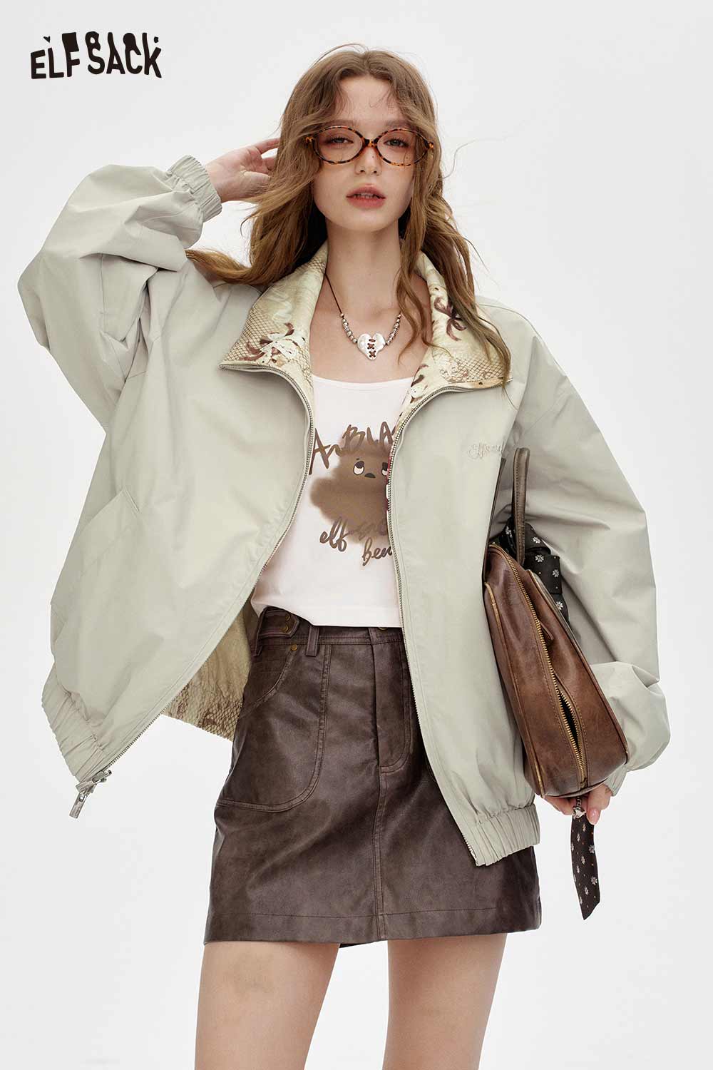 ELFSACK breathable checkered graphic jacket for women styled with a casual outfit