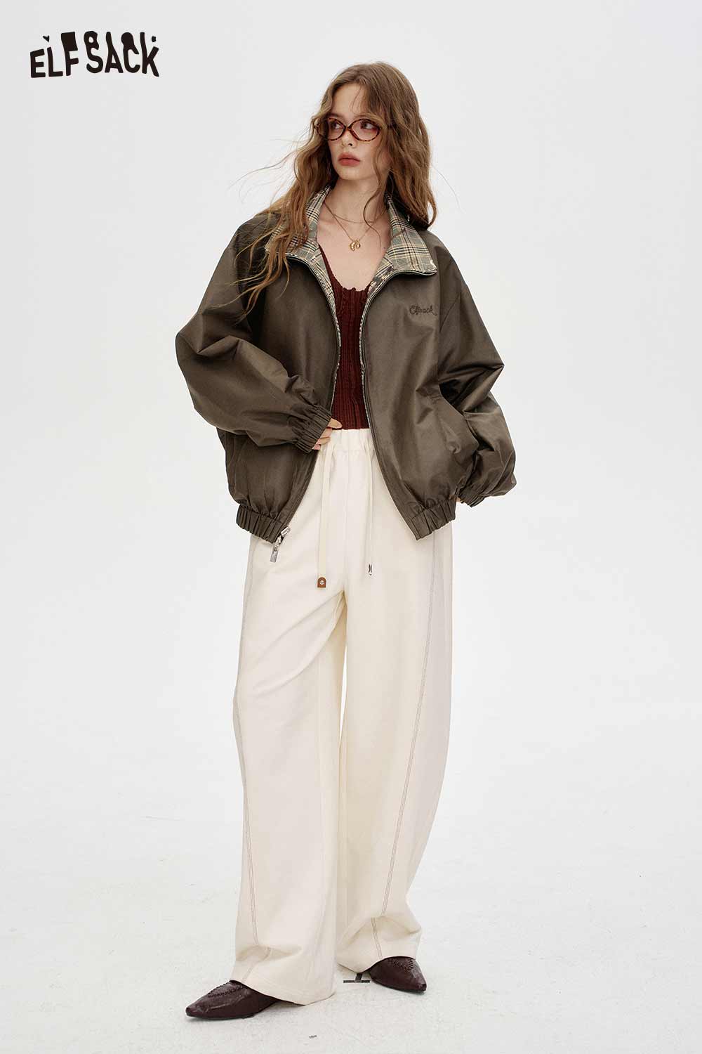 ELFSACK breathable checkered graphic jacket for women in olive green with relaxed fit and zip closure