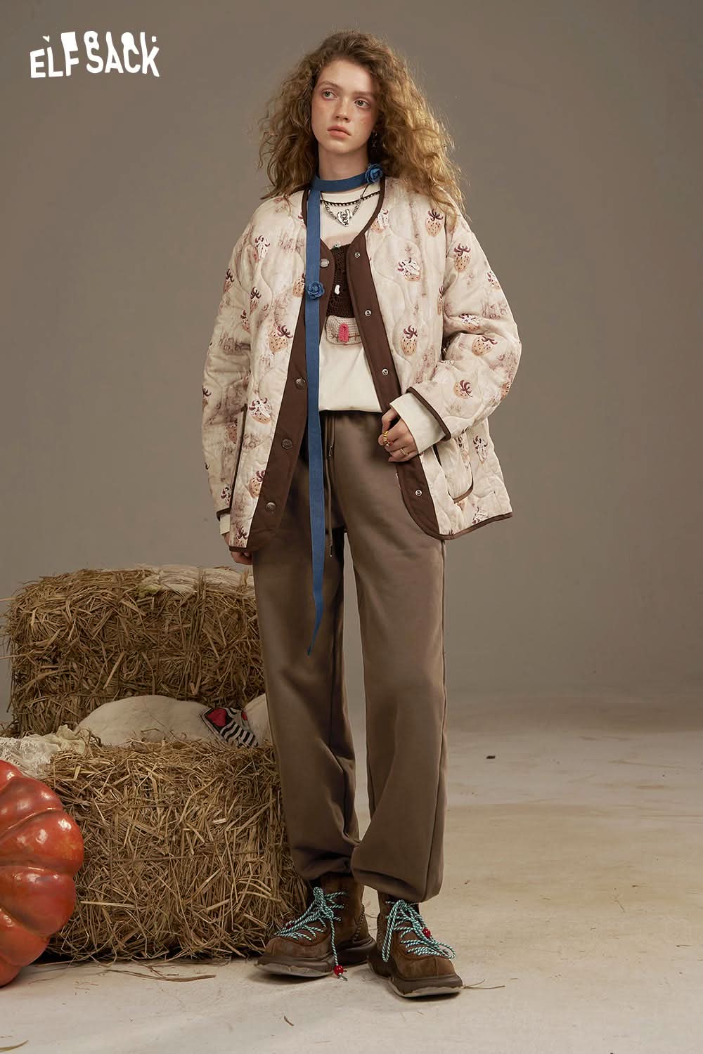 Trendy outfit featuring ELFSACK white cropped sweat pants for women styled with a quilted jacket