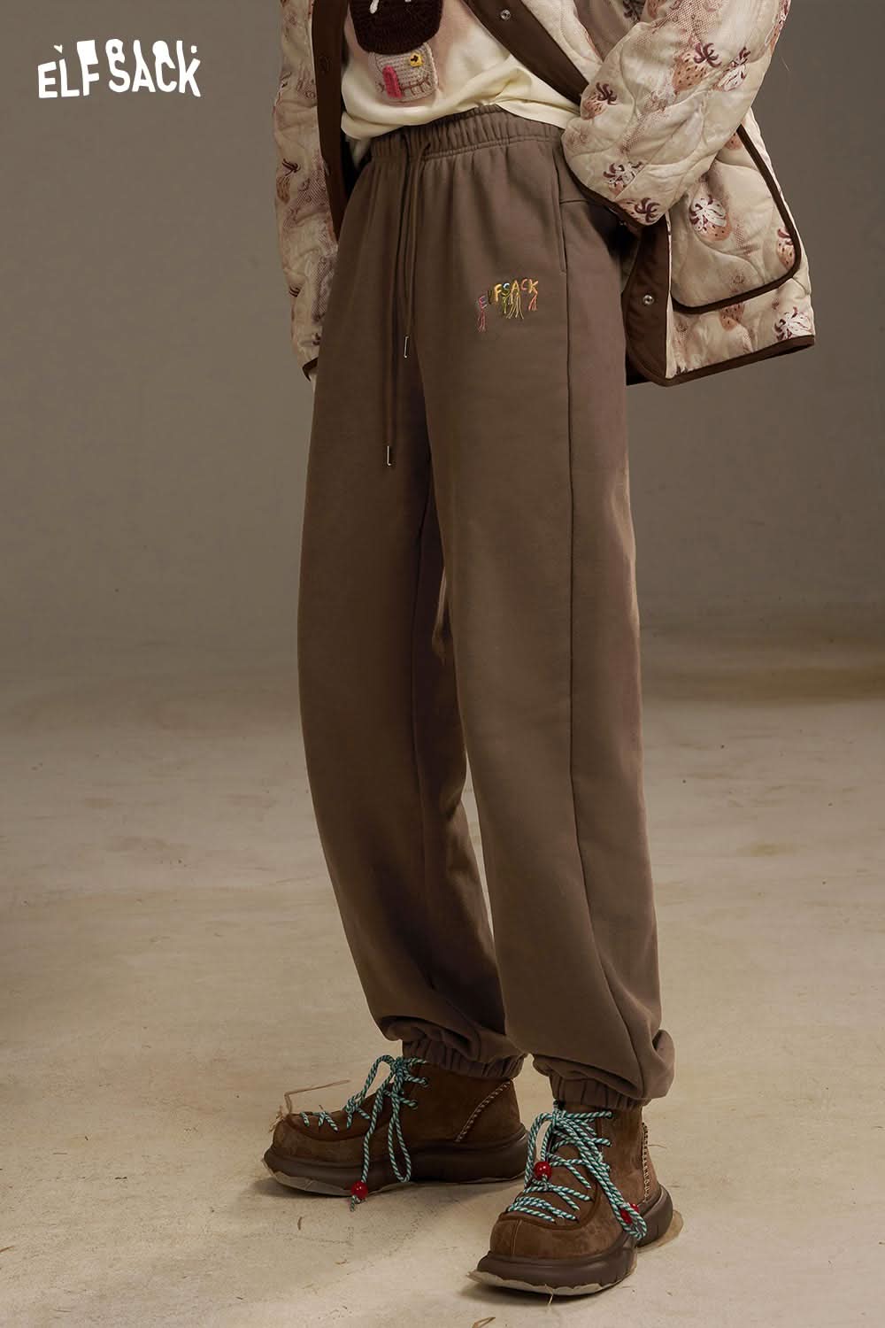 ELFSACK brown pants with an elastic waistband, showcasing a stylish design for casual wear