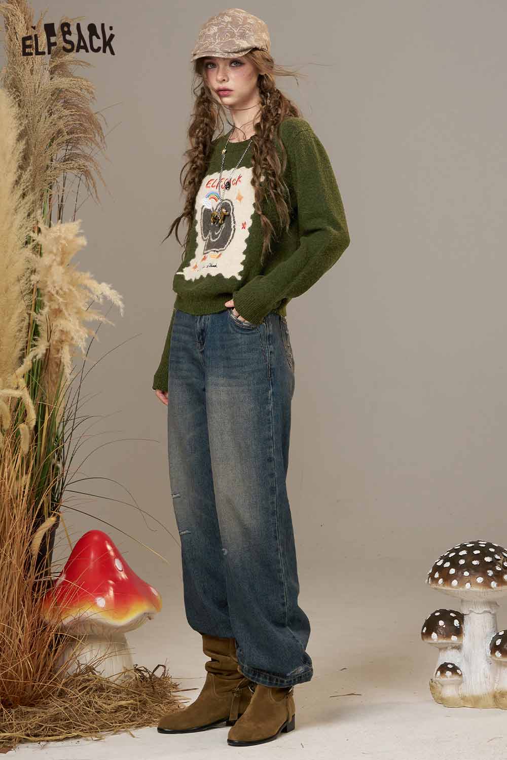 ELFSACK cartoon kitten embroidered sweater in green with fun graphic design, paired with baggy jeans