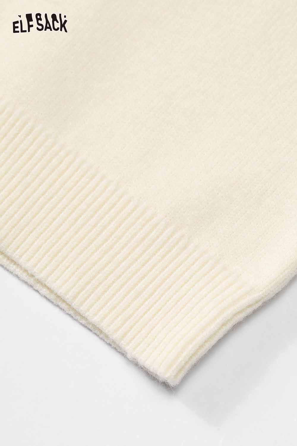 Soft cream ELFSACK cute graphic polo neck sweater with ribbed cuffs for a cozy look