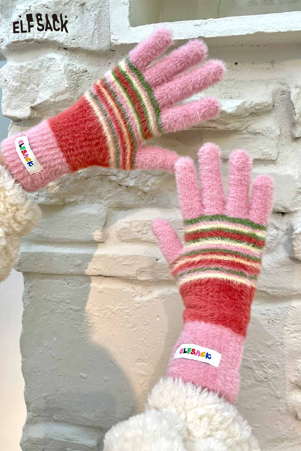 Cute striped finger gloves by ELFSACK in soft pastel colors perfect for stylish winter warmth