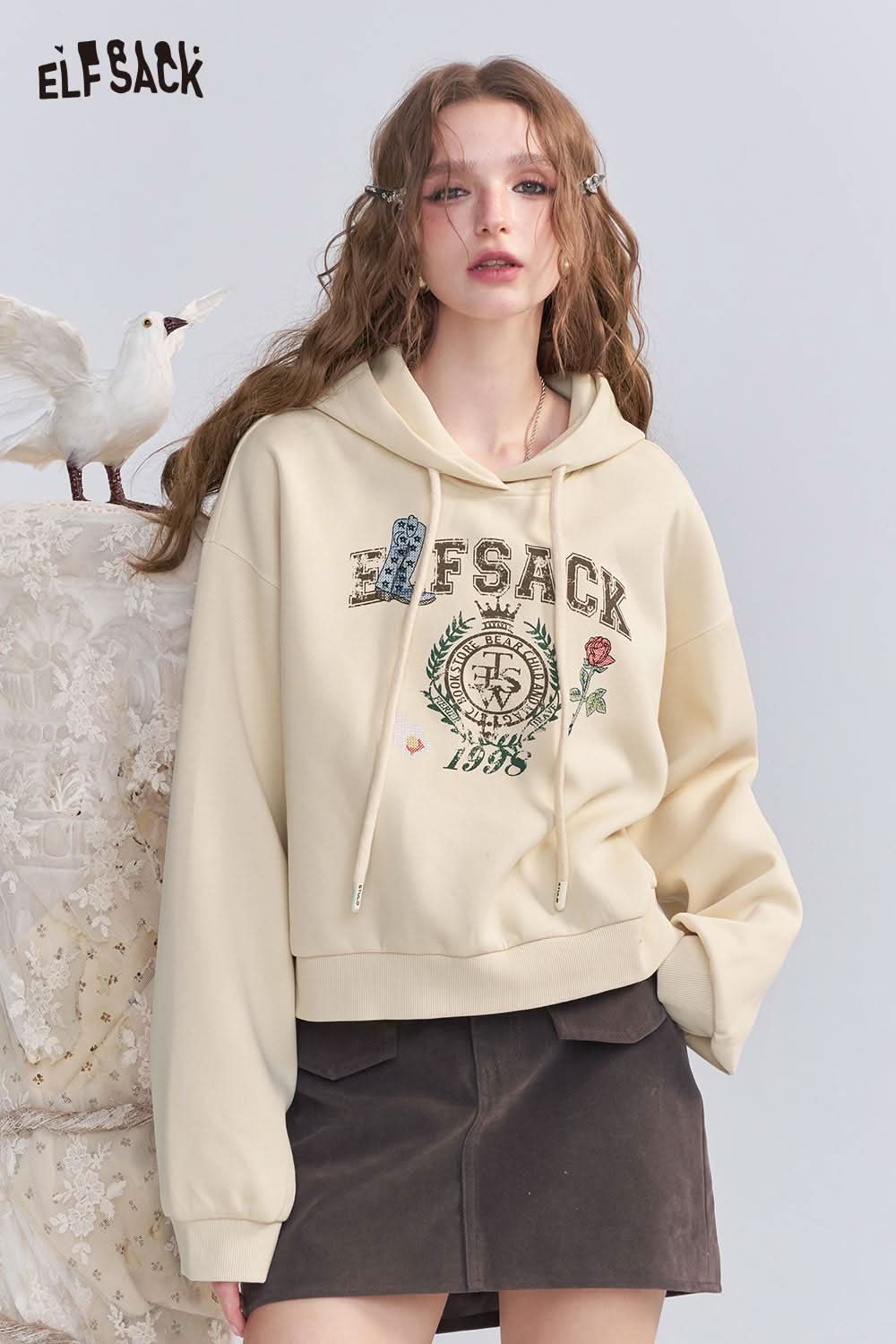 ELFSACK embroidered floral fleece hoodie in cream color with stylish floral embroidery