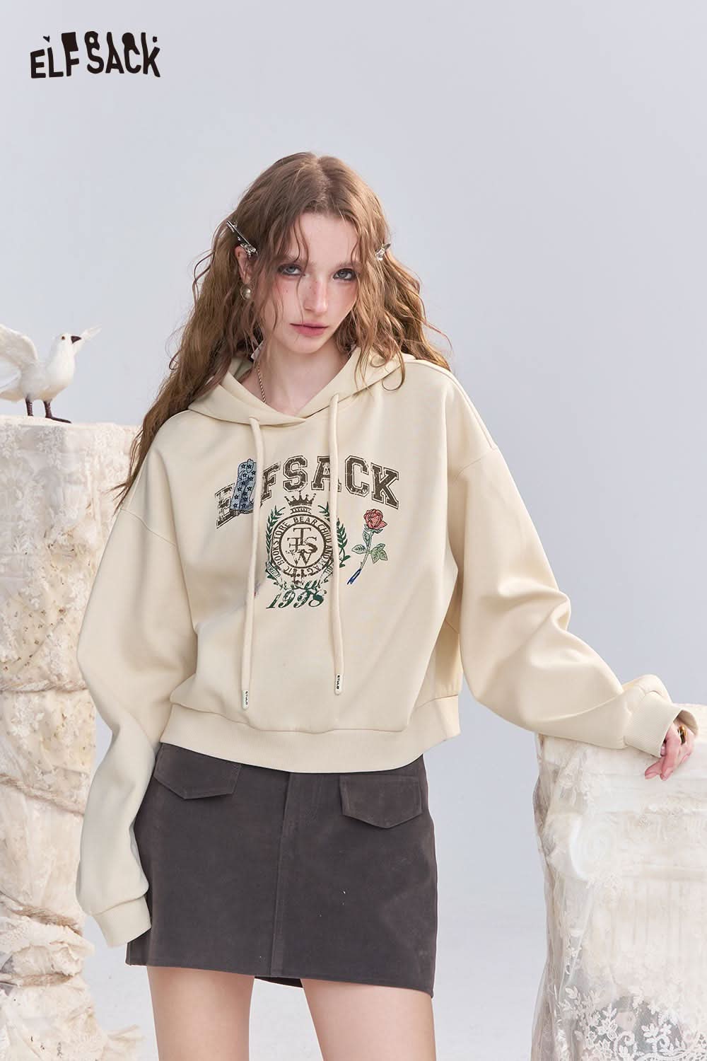 ELFSACK embroidered floral fleece hoodie in cream with a relaxed fit and graphic design