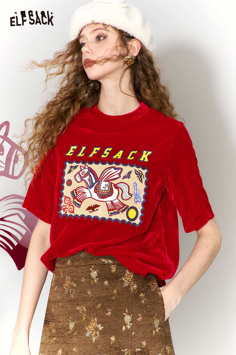 Red ELFSACK flying horse print t-shirt with colorful graphic design on soft fabric