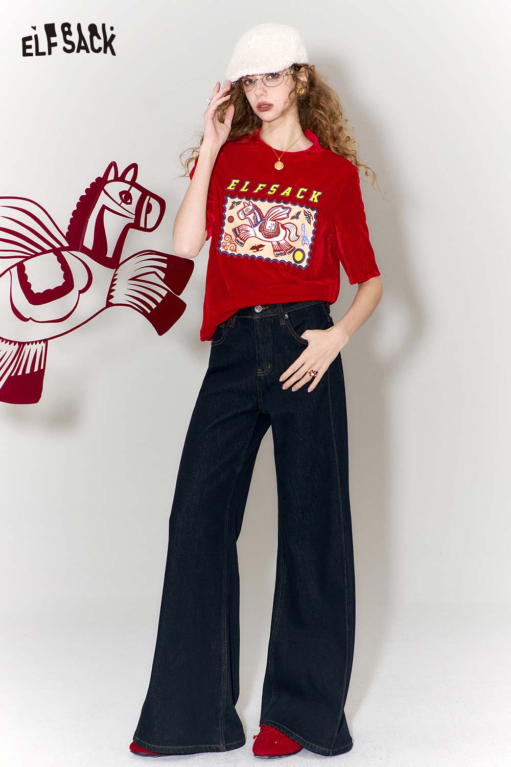 ELFSACK red flying horse print t-shirt featuring a playful design, paired with wide-leg jeans
