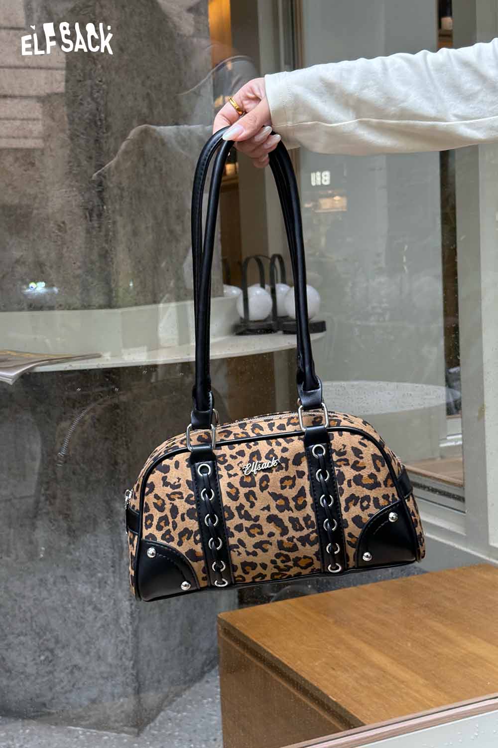 ELFSACK leopard print crossbody bag with black straps and stylish design for everyday use
