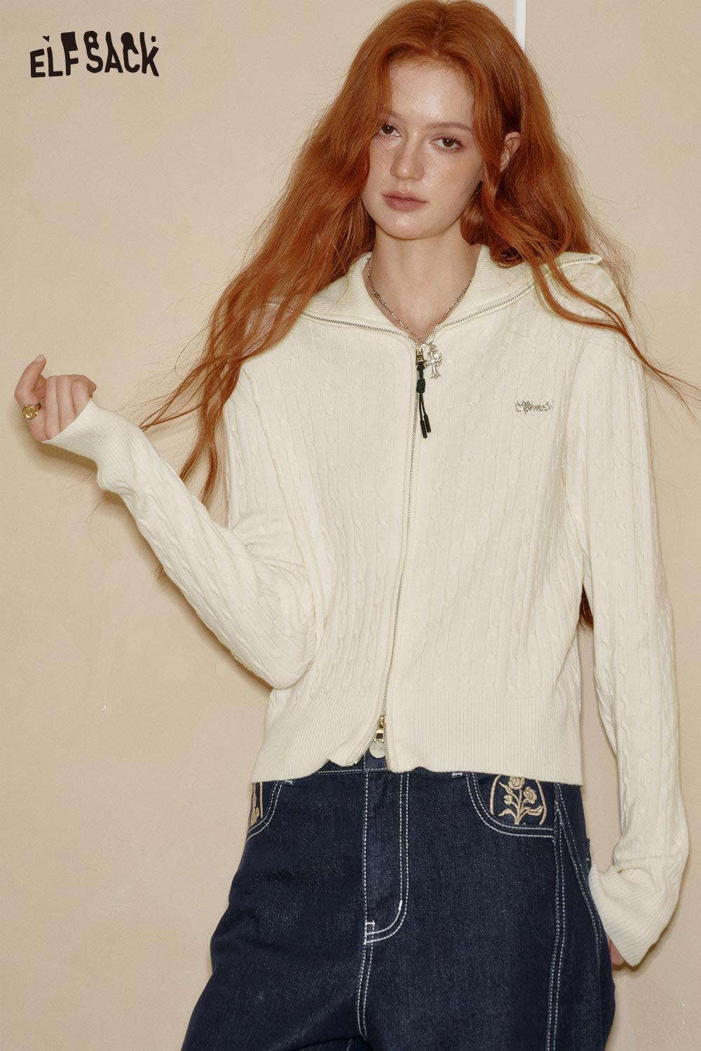 ELFSACK minimalist slim fit knit top with a zip-up design and cozy texture in cream color