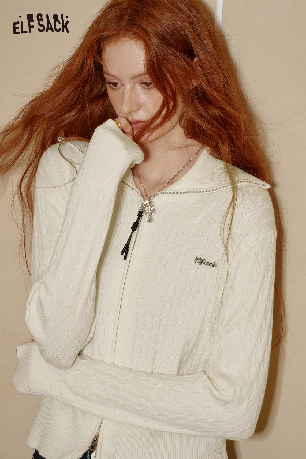ELFSACK cream minimalist slim fit knit top with a zipper and collar for a stylish look
