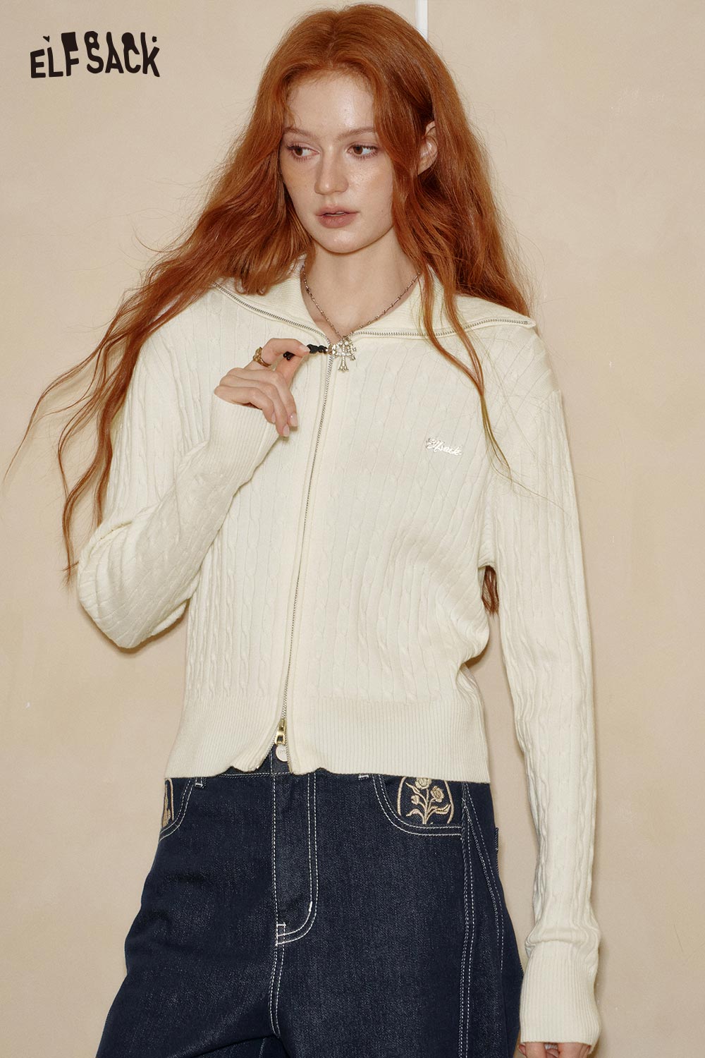ELFSACK minimalist slim fit knit top in cream color with a zip-up design and stylish ribbed texture