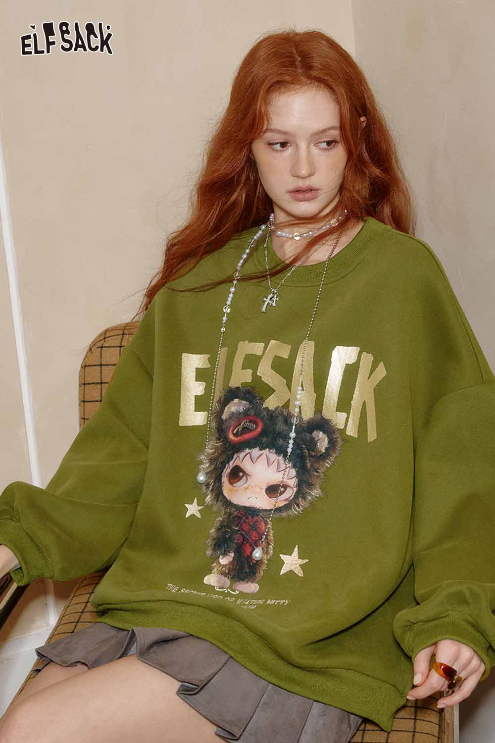 ELFSACK oversized graphic sweatshirt for women in olive green with playful bear print and cozy fit