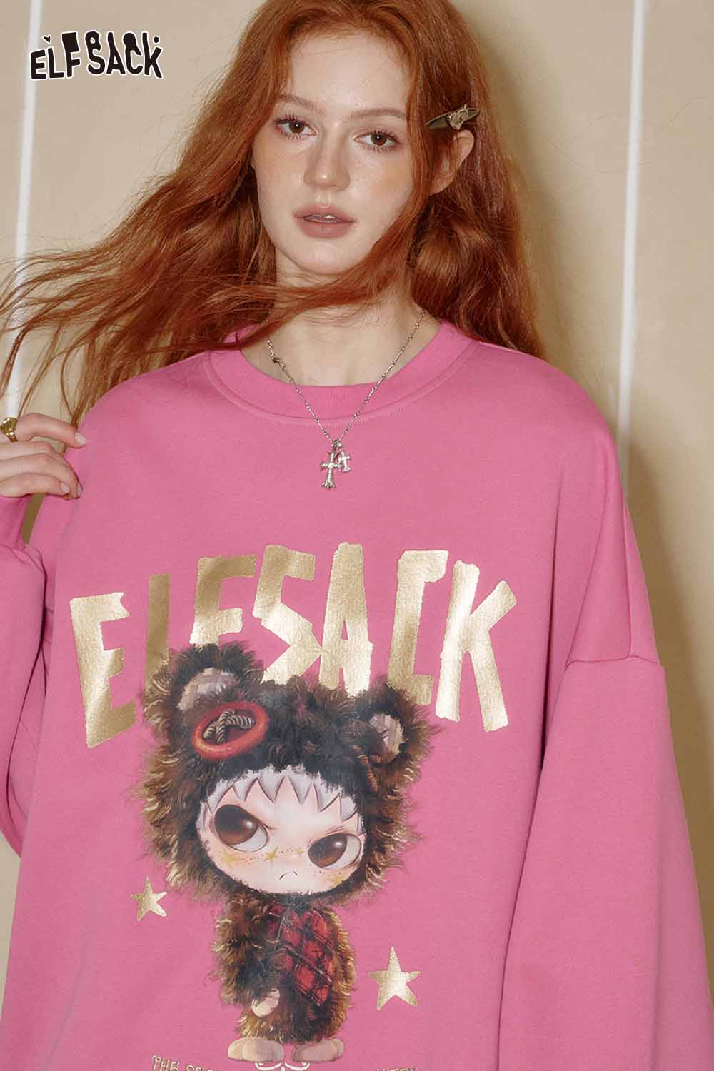 ELFSACK oversized graphic sweatshirt for women in pink with a cute bear character design