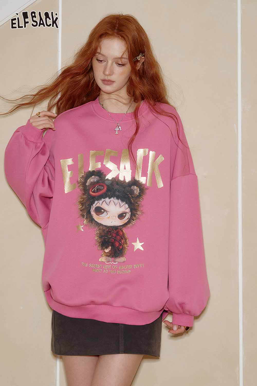 ELFSACK oversized graphic sweatshirt for women in pink with quirky character design and relaxed fit