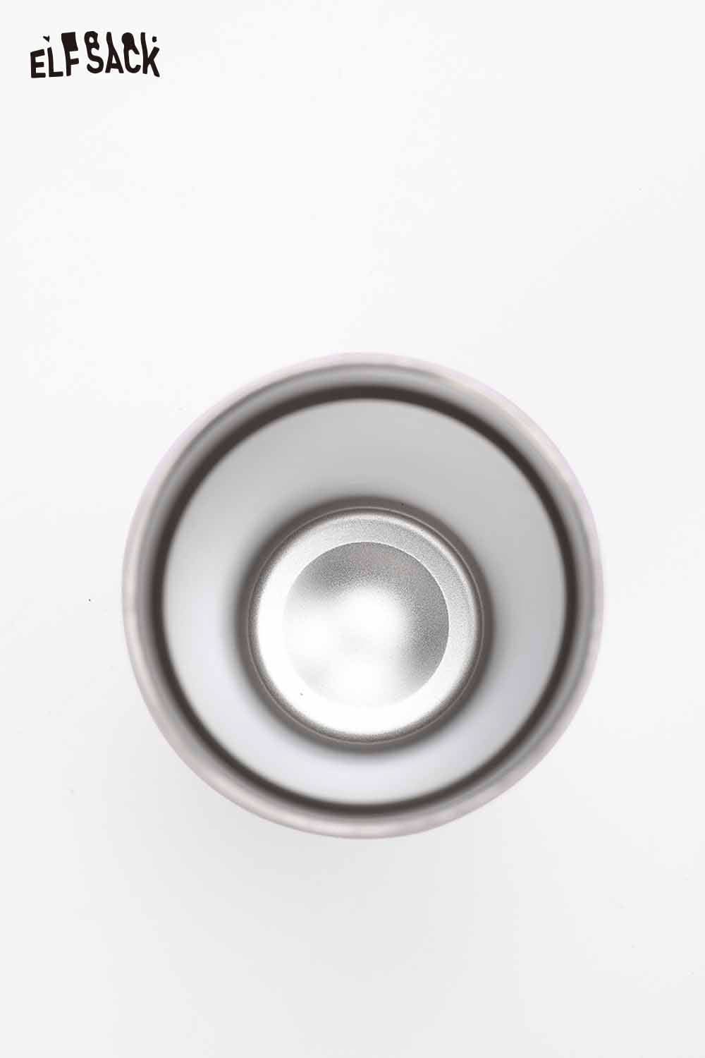 Inside view of an ELFSACK plaid stainless steel tumbler showcasing its sleek design and durable interior